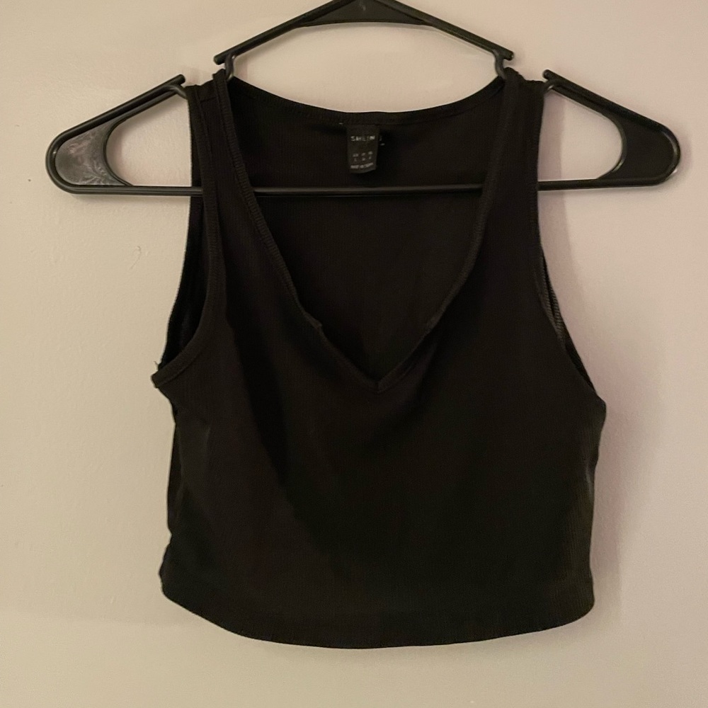 Black v-neck crop top.